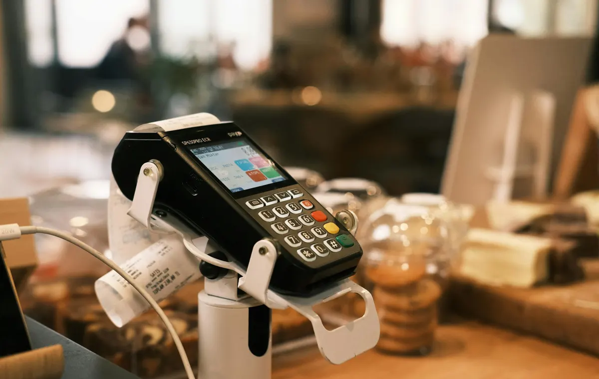 Card payment terminal on a restaurant counter